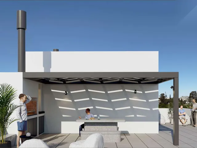Terraza accesible con parrilla, pérgola y vista al Parque Las Brujas